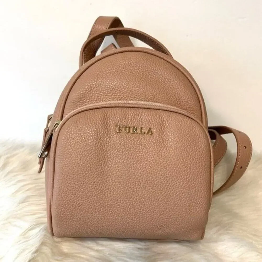Furla Frida Mini backpack in Moonstone ( pale pink) with Rose Gold hardware New